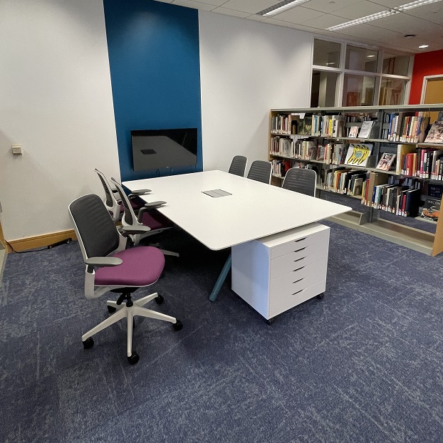 image of downstairs library work area